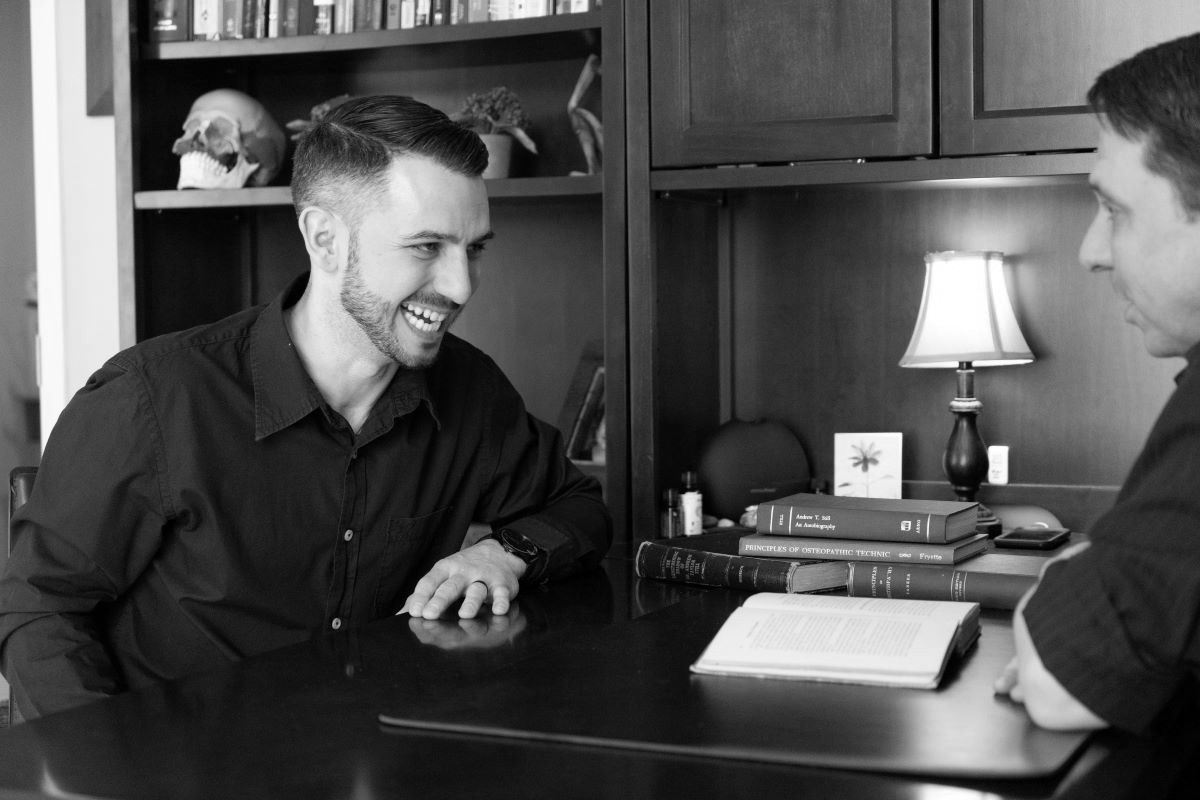 Osteopathically Speaking, speaking with a client